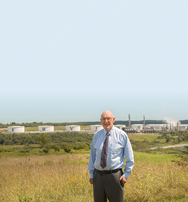 Mr Irving Standing in front of the irving Oil refinery in Saint John NB